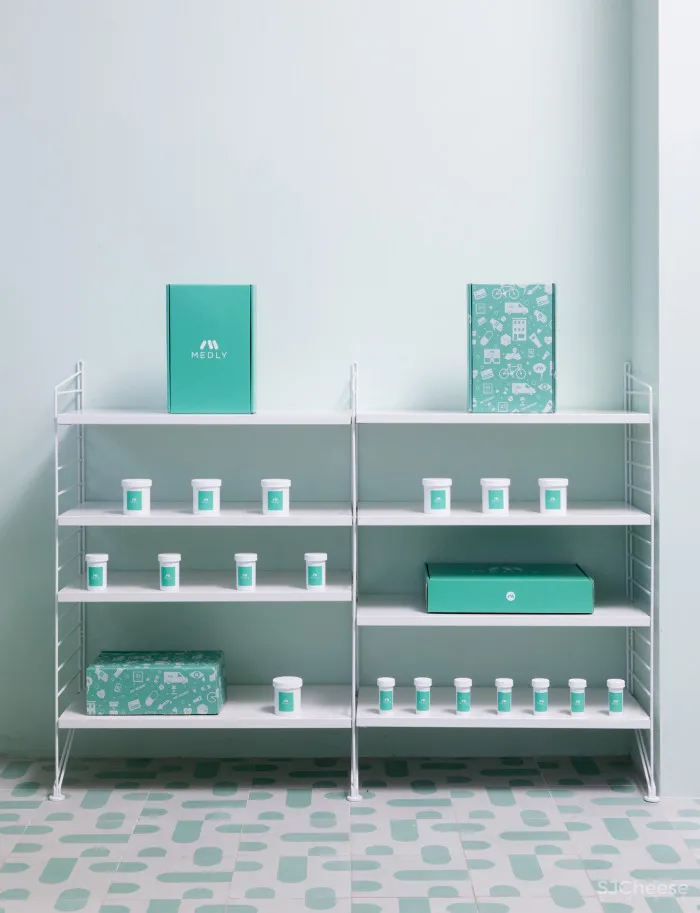 Pharmacy app opens Brooklyn waiting room featuring calming turquoise tones