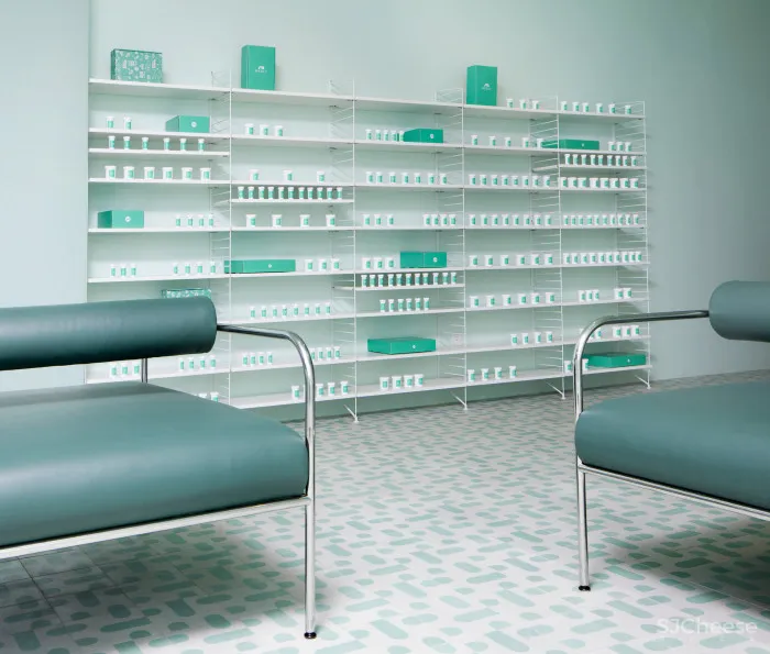 Pharmacy app opens Brooklyn waiting room featuring calming turquoise tones