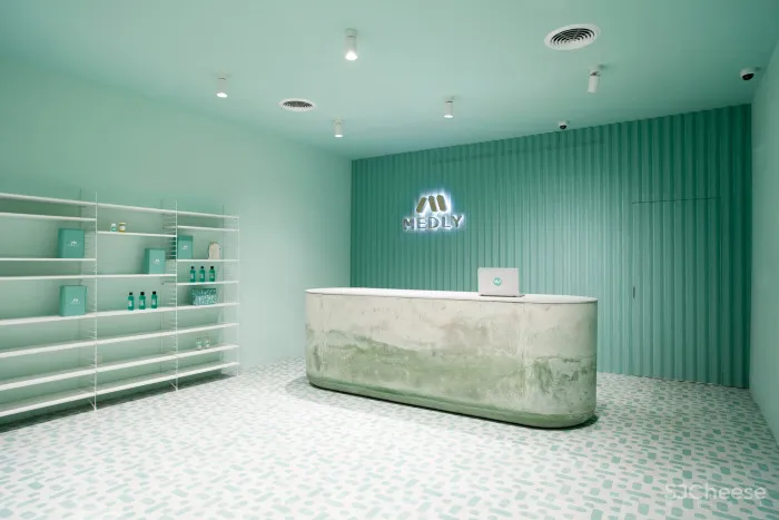 Pharmacy app opens Brooklyn waiting room featuring calming turquoise tones