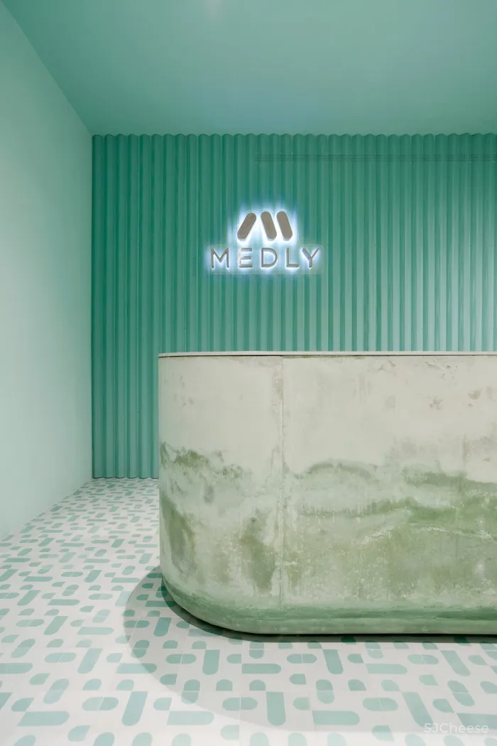 Pharmacy app opens Brooklyn waiting room featuring calming turquoise tones