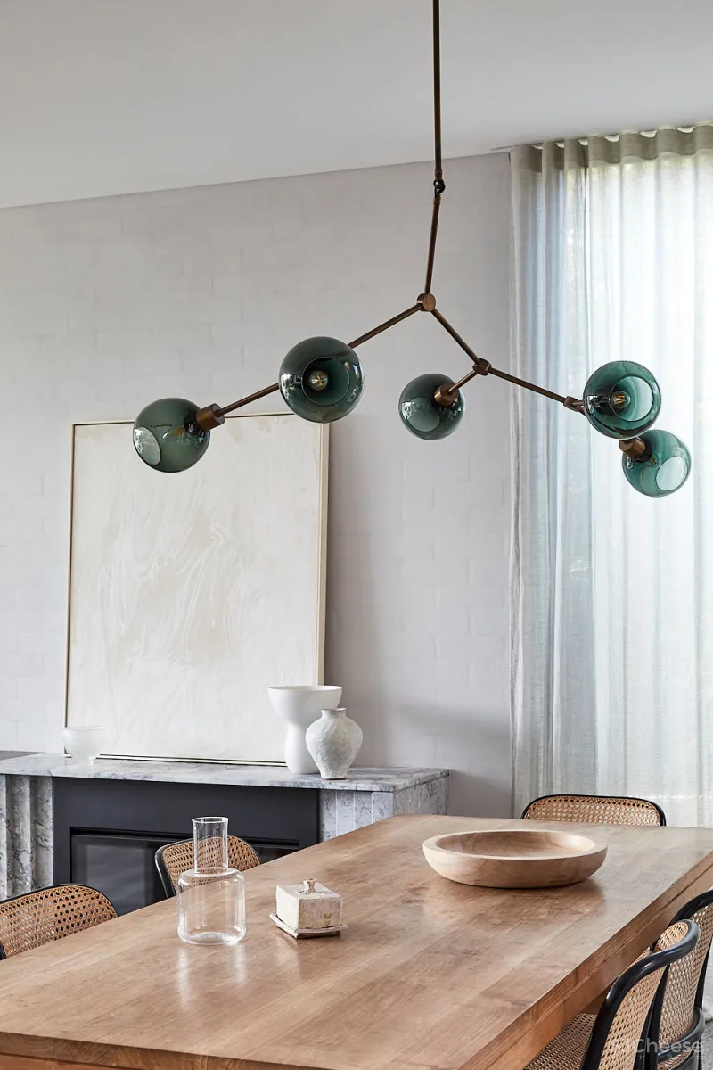 A CRAFTED LANTERN CARTHONA HOUSE BY DANIEL BODDAM STUDIO.