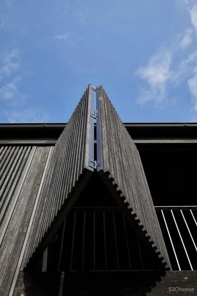 A CRAFTED LANTERN CARTHONA HOUSE BY DANIEL BODDAM STUDIO.