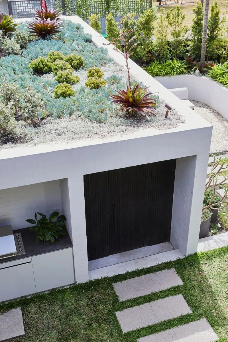 A CRAFTED LANTERN CARTHONA HOUSE BY DANIEL BODDAM STUDIO.