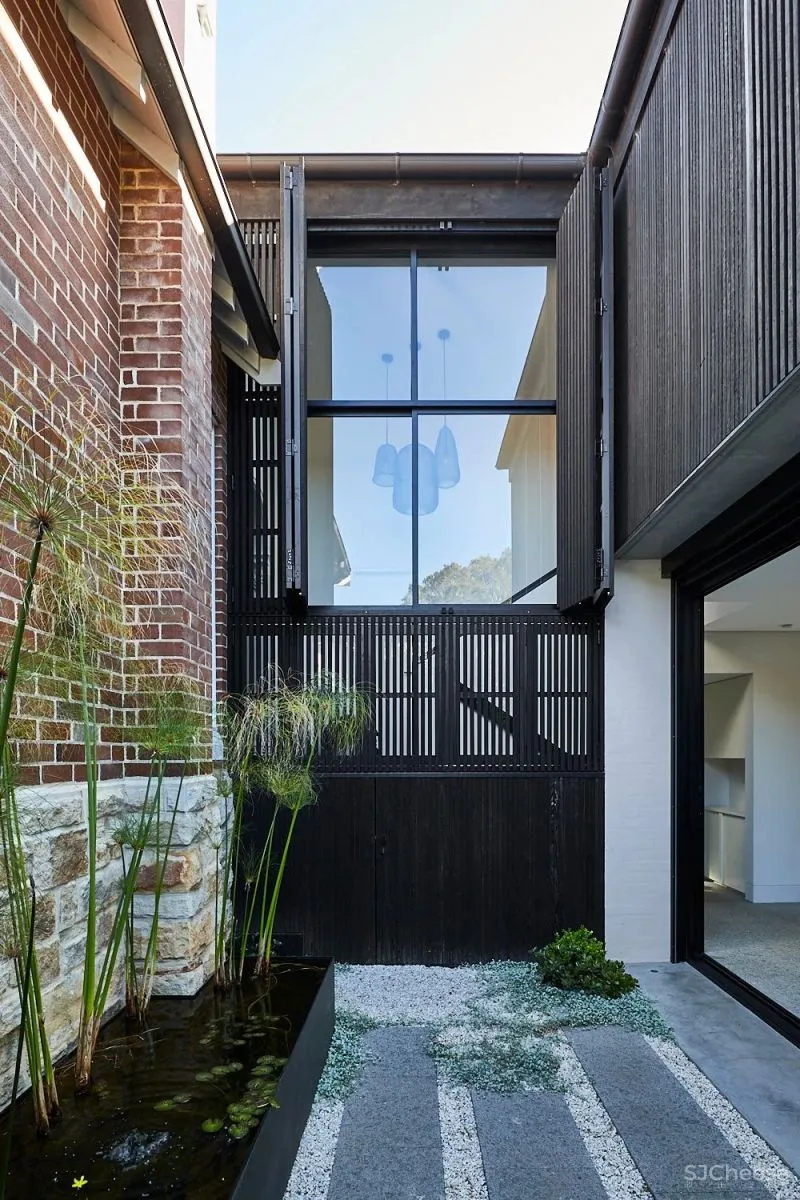 A CRAFTED LANTERN CARTHONA HOUSE BY DANIEL BODDAM STUDIO.