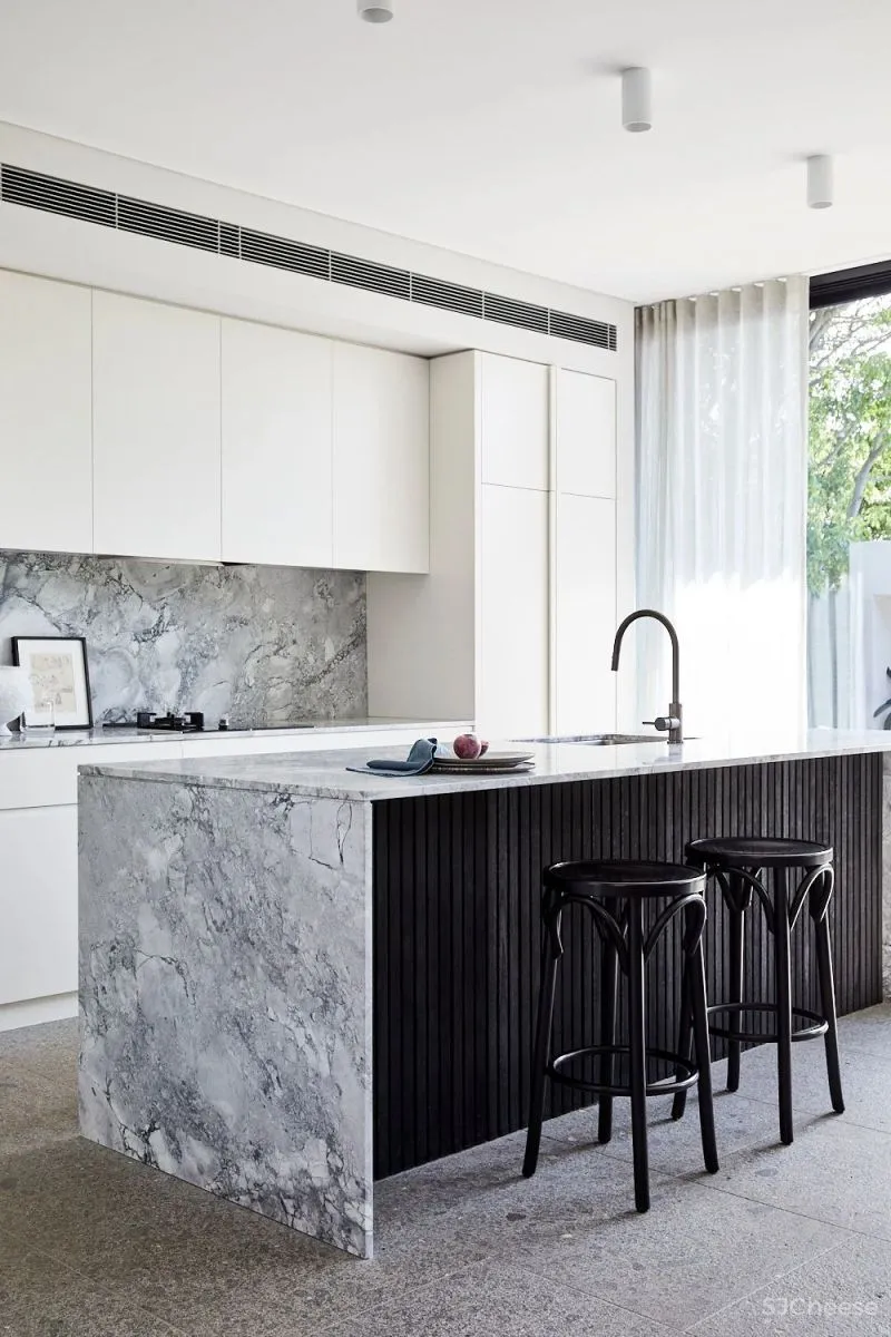 A CRAFTED LANTERN CARTHONA HOUSE BY DANIEL BODDAM STUDIO.