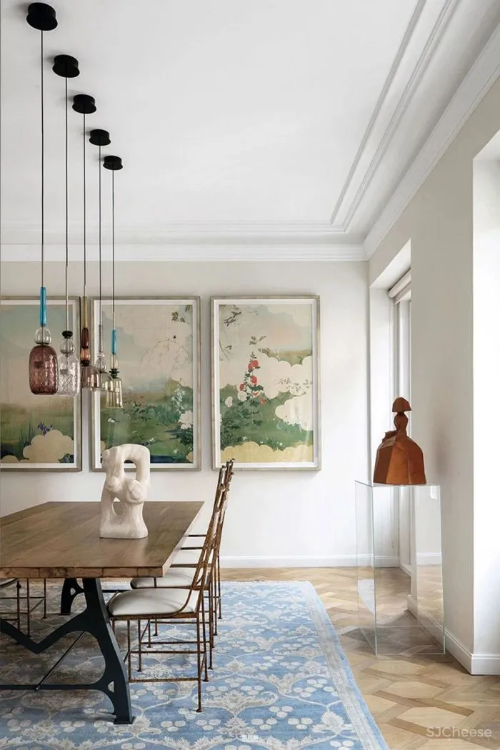 当代设计和艺术品为这座历史悠久的马德里公寓注入新无限活力