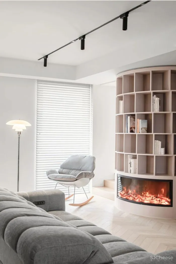 惊奇!他们在房中央造了个圆柱书架,折叠门 壁炉,串联起120㎡温暖通透家