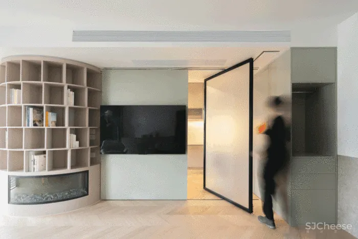 惊奇!他们在房中央造了个圆柱书架,折叠门 壁炉,串联起120㎡温暖通透家