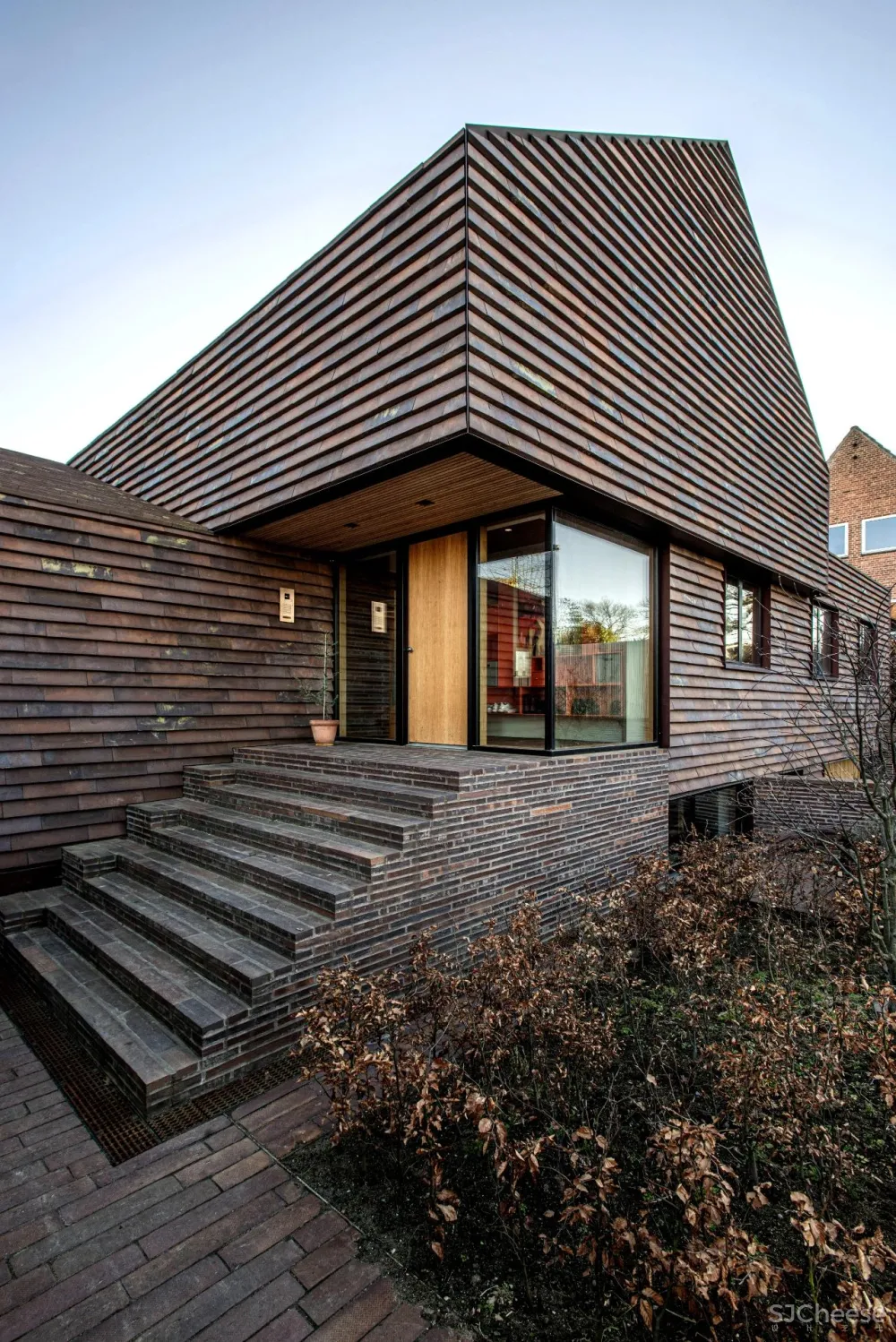 C.F. Møller设计 红砖堆砌的几何体 “E 别墅” 简约坚硬且舒适雅致