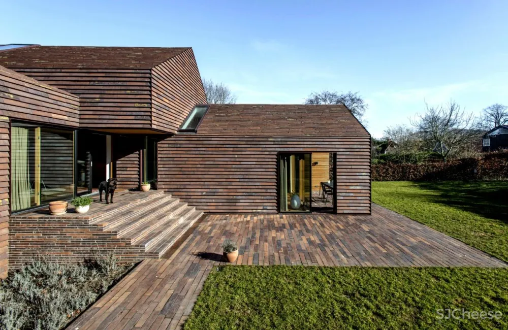 C.F. Møller设计 红砖堆砌的几何体 “E 别墅” 简约坚硬且舒适雅致