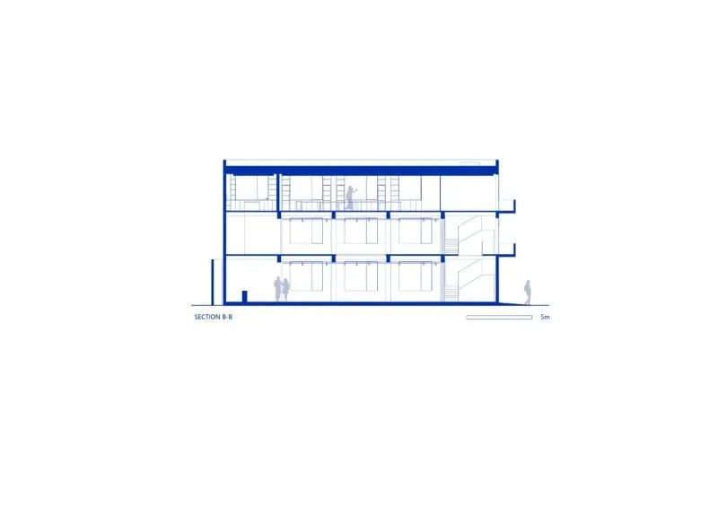 Team BLDG transforms factory bathhouse into skylit art gallery