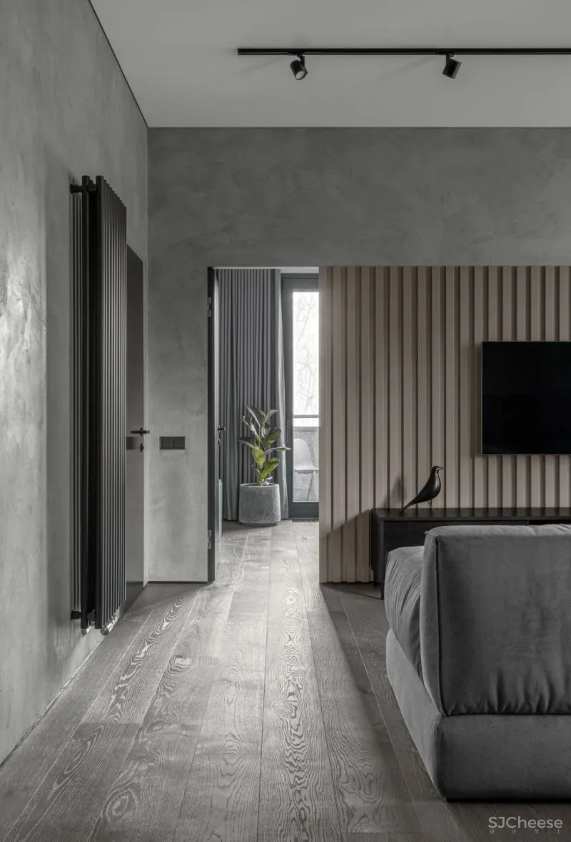 一间75平米的水泥灰公寓，利用色彩的装饰，拥有时髦与平衡感