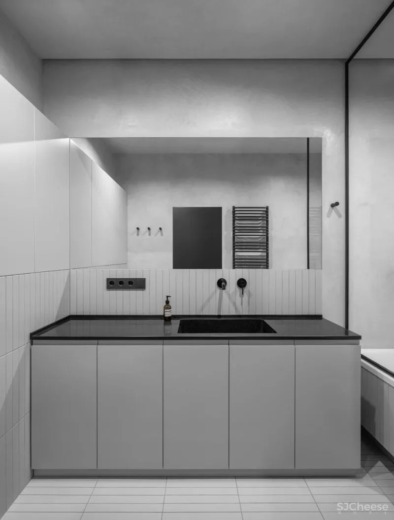 一间75平米的水泥灰公寓，利用色彩的装饰，拥有时髦与平衡感