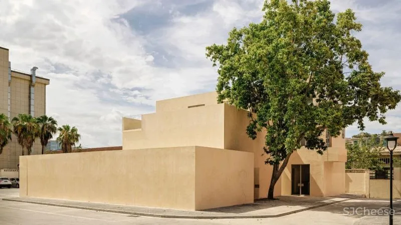 Team BLDG transforms factory bathhouse into skylit art gallery