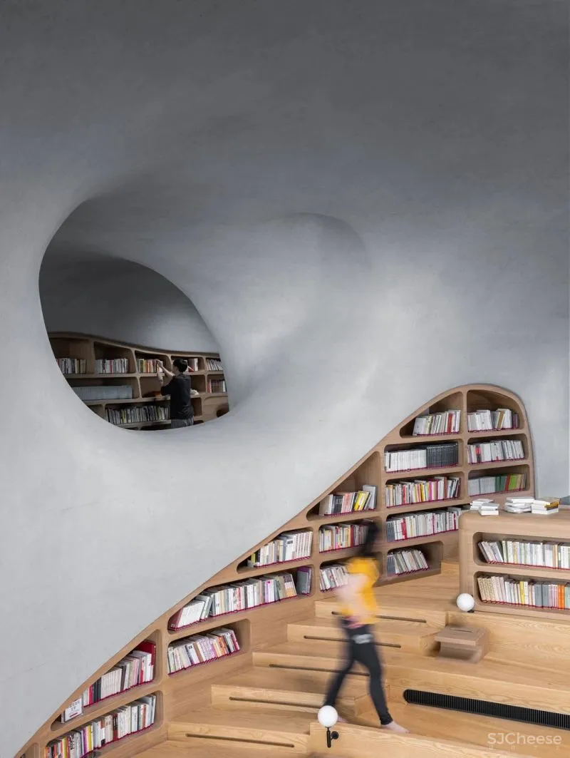 MAD在海口设计的「云洞图书馆」建成!室内外混凝土整体浇筑一次成型!