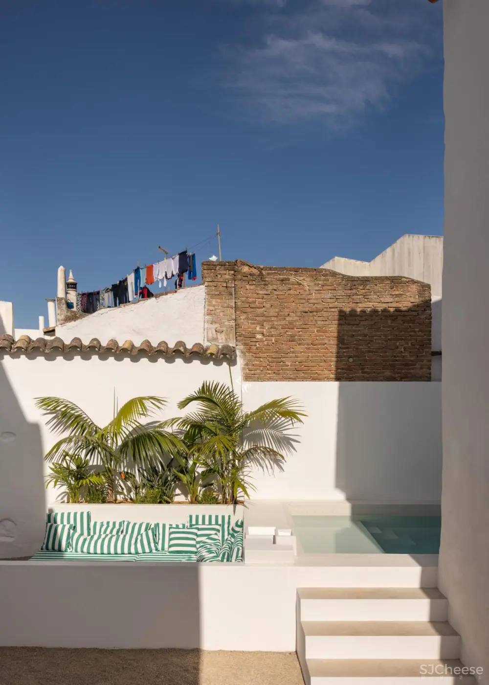 葡萄牙卡萨夸特罗度假屋,由比利时酒店品牌theaddress设计。